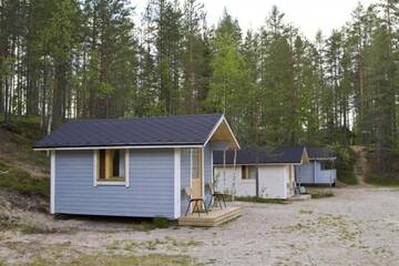 Фото номера Коттедж с общей ванной комнатой (для 3 взрослых) Кемпинги Kangasjoki Camping г. Суомуссалми 3