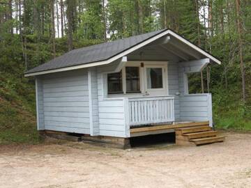 Фото номера Небольшой коттедж с общей ванной комнатой Кемпинги Kangasjoki Camping г. Суомуссалми 3