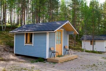 Фото номера Коттедж с общей ванной комнатой (для 3 взрослых) Кемпинги Kangasjoki Camping г. Суомуссалми 8
